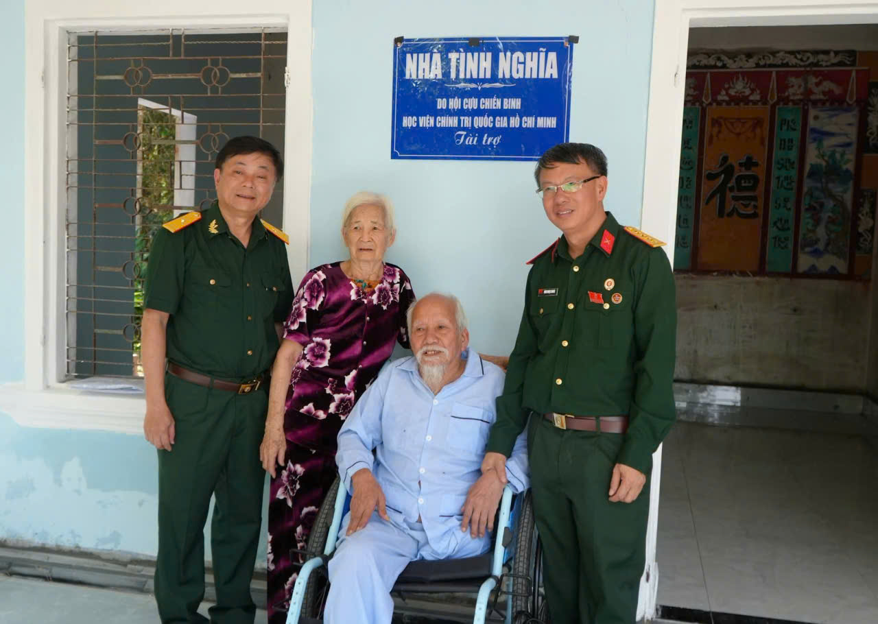 A group of people posing for a photo Description automatically generated
