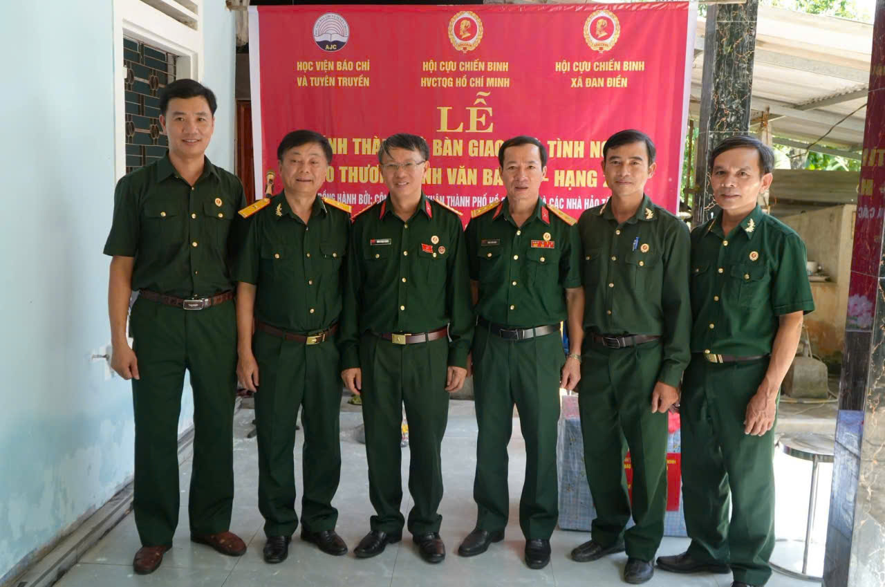 A group of men in green uniforms Description automatically generated